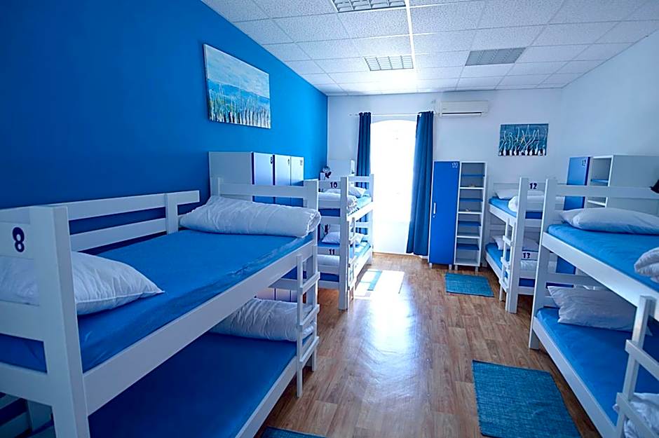 Photo 1 of 8 of Bed in 8-Bed Mixed Dormitory Room with Sea View