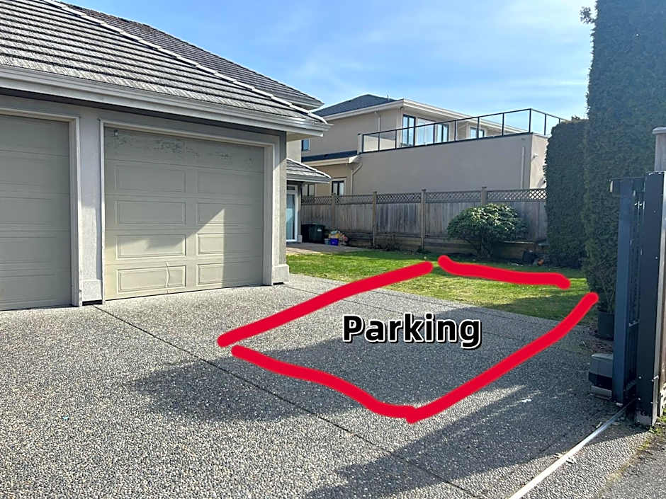 A cozy bedroom with a private washroom close to YVR Richmond
