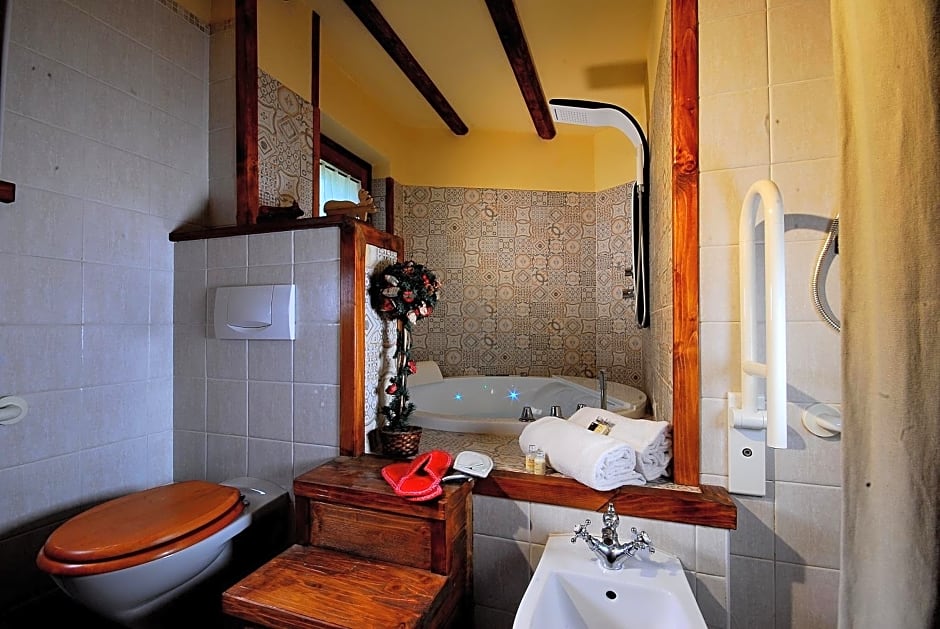 Aparthotel Foyer d'antan SUITE con caminetto hammam o vasca idromassaggio