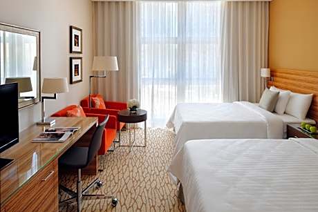 Twin Room with Yas Theme Park tickets, 1 park access pp per day, for one of the parks (Warner Bros, Yas Waterworld, Ferrari World, SeaWorld) with Shuttle Service