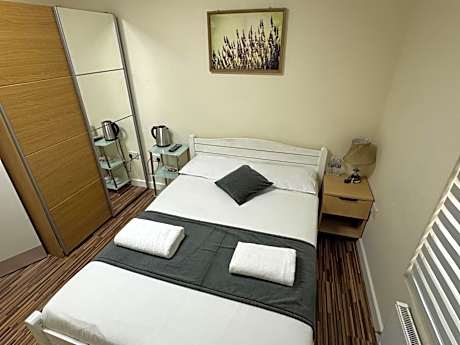 Standard Double Room with Shared Bathroom