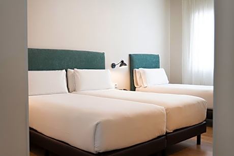 Triple Room (2 Adults + 1 Child)