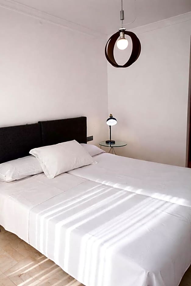 Photo 1 sur 8 de Triple Room