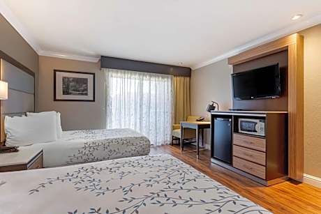 2 Queen Beds, Non-Smoking, High Speed Internet Access, Refrigerator, Coffee Maker, Iron And Ironing 