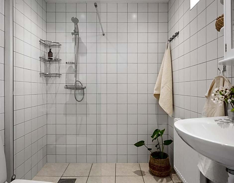 Comfortable guest rooms with fully equipped kitchen and cosy living room.