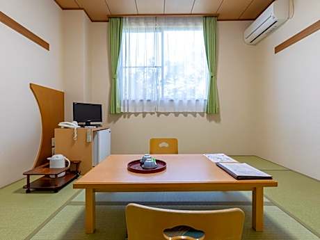 Quadruple Room with Shared Bathroom