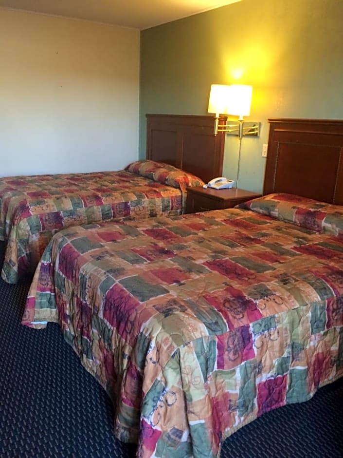 Rest Inn - Extended Stay, I-40 Airport, Wedding & Event Center