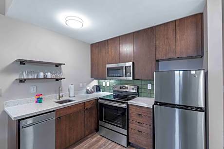 One-Bedroom King Suite with Sofa Bed and Roll-in Shower - Mobility and Hearing Accessible