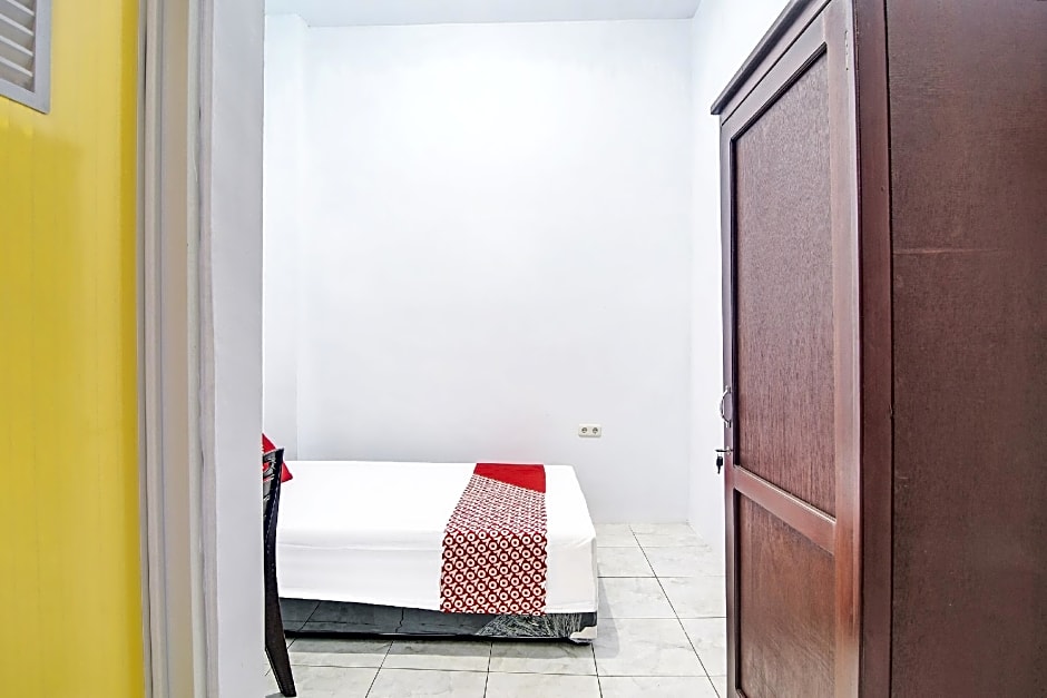 SPOT ON 91995 Cvictory Inn