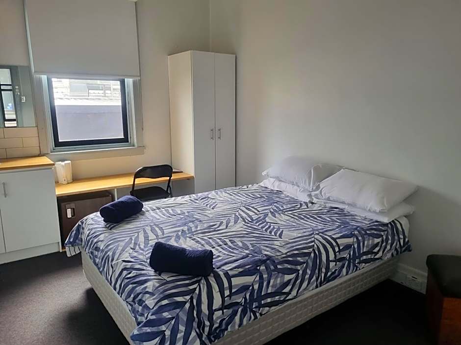 Photo 1 of 2 of Queen Room with Shared Bathroom