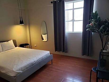 Queen Room with Shared Bathroom