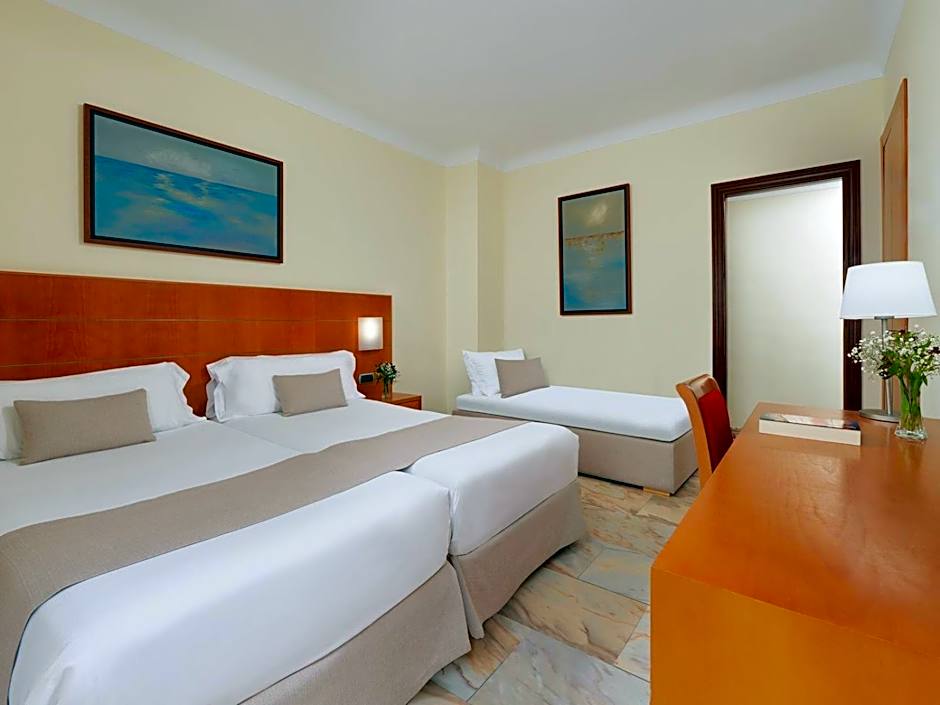 Photo 1 of 3 of Triple Room (3 Adults)