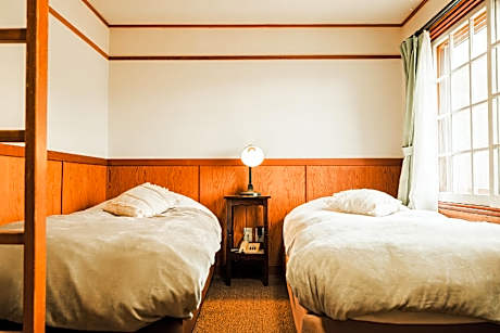 Triple Loft Room 208 with Shared Bathroom