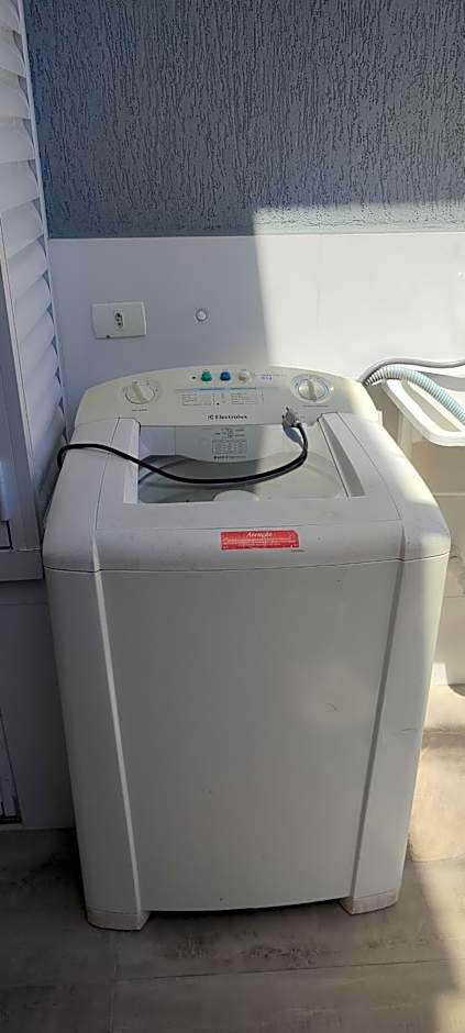 Casa com piscina duas quadras da praia