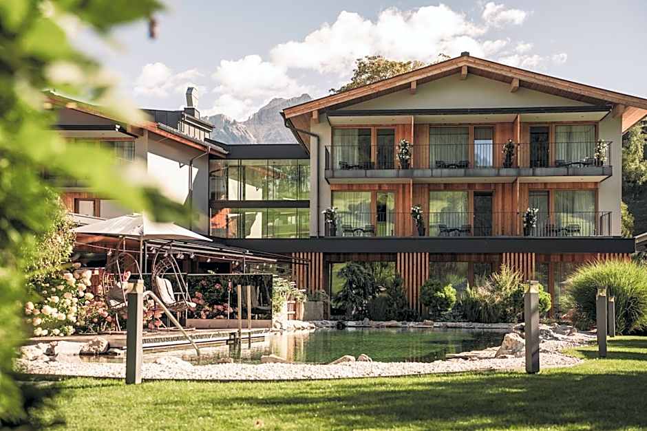Wellness und Brunch Hotel MorgenZeit beheizter Naturteich Genuss Frühstück bis 13 Uhr Hochkönig Sommercard