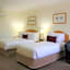 Carlyle Suites & Apartments