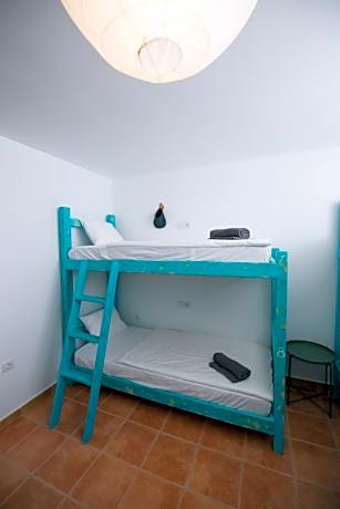 8-Bed Mixed Dorm: Flexible Bunk Space (Upper/Lower Subject to Availability)