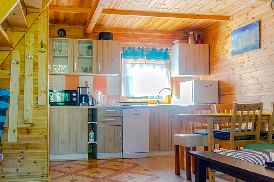 Sztil - Apartamenty i drewniane domki