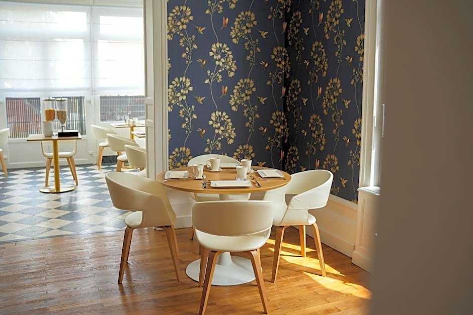 Hôtel Échappée en Baie - Parking privé gratuit dont forfaits bornes électriques réservable