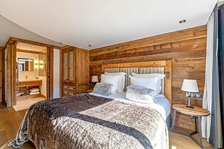Comfort room with balcony and village view