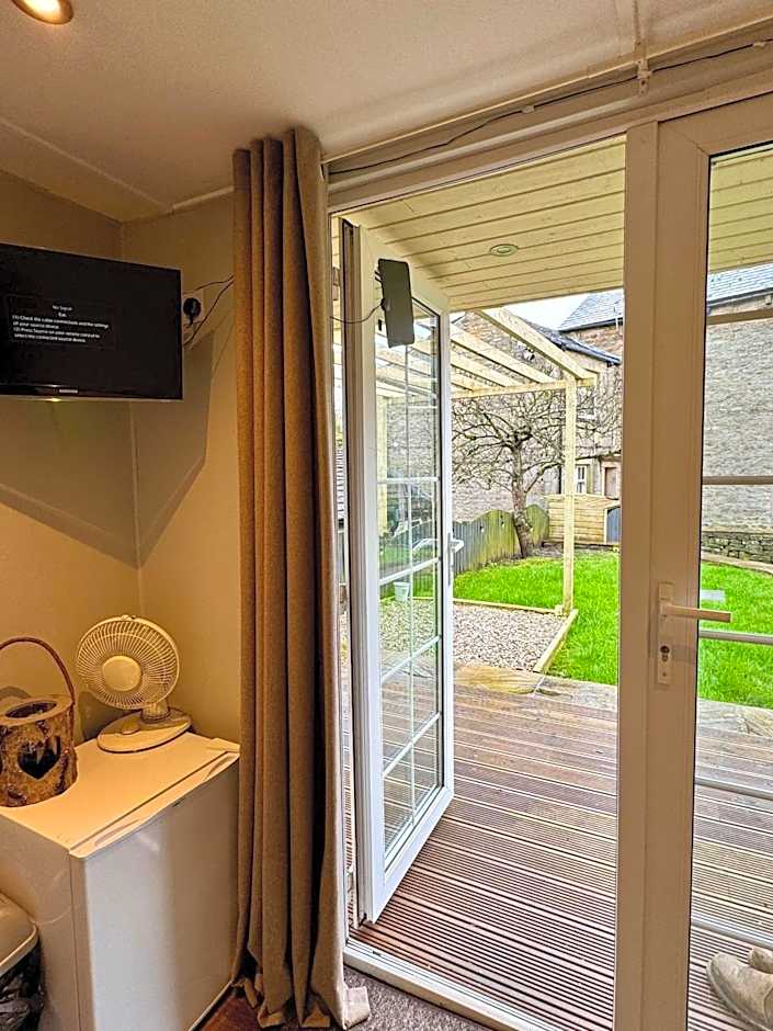 Apple tree hut, in a private garden