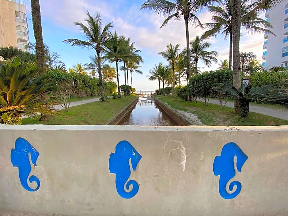 Flat Estudio 220 amarílis 3 Piscinas climatizadas, carregar veiculo eletrico, Bertioga, Riviera de São Lourenço Apartamento estúdio, cozinha equipada completa, serviço de hotelaria, limpeza e trocas diária de toalhas, WI-FI 500 MB