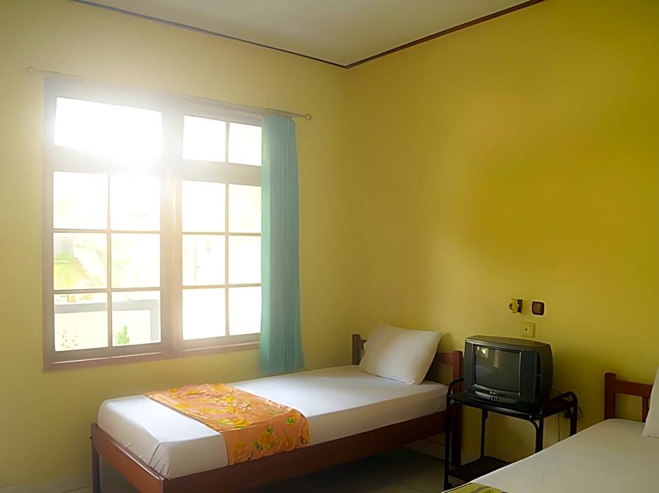 Super OYO 1654 Maha Bharata Kuta Inn