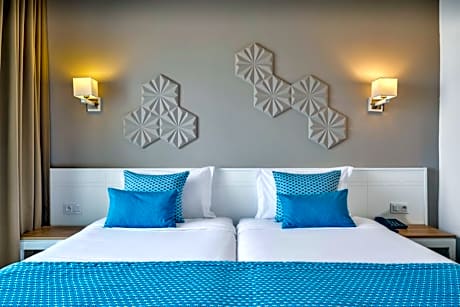 Triple Room (2 Adults + 1 Child)
