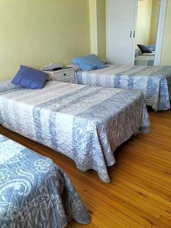 Single Bed in Dormitory Room