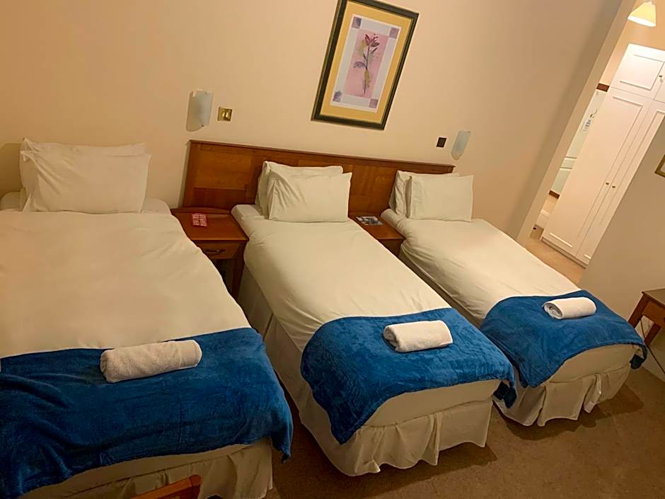 Photo 1 of 2 of Triple Room