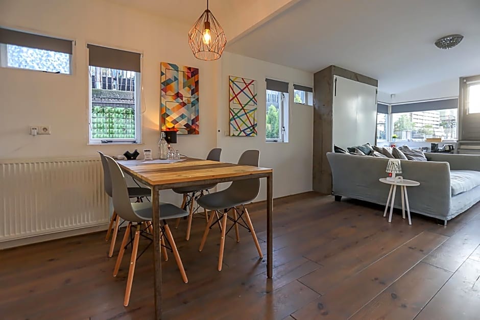 HouseBoat next to AMSTEL