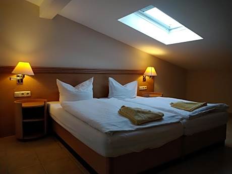 Single room courtyard view / possibly sloping roof