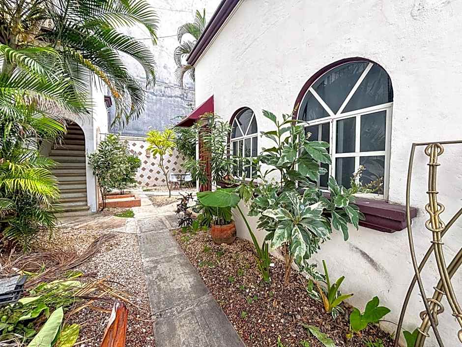 "Spacious Suite with 4 Bedrooms and Amenities"