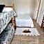 KITNET S2 em TORRES-RS - Na mais bela praia Gaúcha - Cozinha - Banheiro - Ar condicionado - TV smart 32' - Wi-Fi - Estacionamento - Anfitriã Superhost no BnB