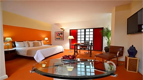 Junior suite con una cama