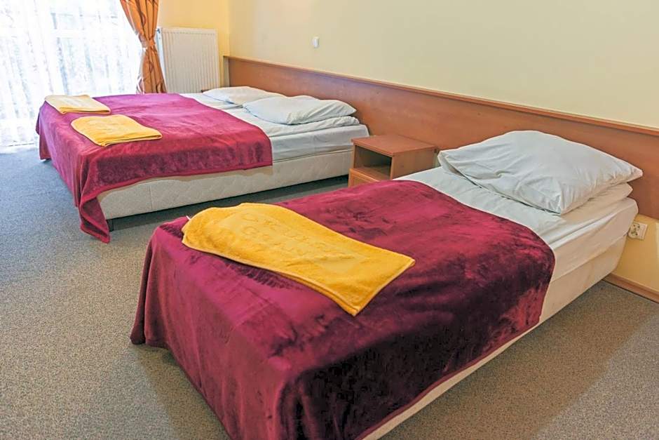 Okulski Grand Rozewie Pokoje i Apartamenty