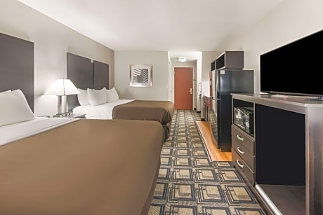 Efficiency Quadruple Room with Two Queen Beds - Non Smoking