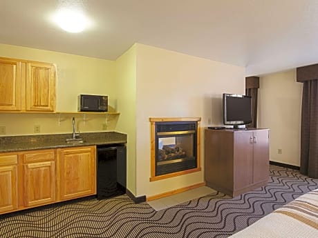 1 King Bed, Non-Smoking, Fireplace, Whirlpool, 55 Inch Flat Screen Television, Wet Bar, Robe, Full Breakfast