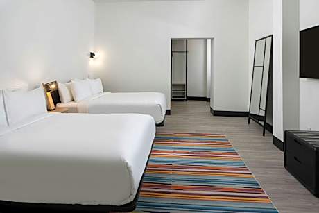 Two-Bedroom Suite with One King Bed and Two Queen Beds