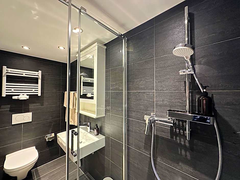 Boutique Hotel Niesenblick - direkt am Thunersee gelegen mit SELF CHECK IN & digitaler Rezeption