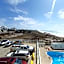 COUPLES GETAWAY, HONEYMOON SWEET, Perfectly Cozy Beach Front Condo with kitchen, pool, free parking,CHECK-IN AT DOOR