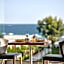 Cavo Orient Beach Hotel & Suites
