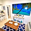 Tropical Beach Condo - Pool, Shops, 86" TV, WiFi