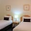 Carlyle Suites & Apartments