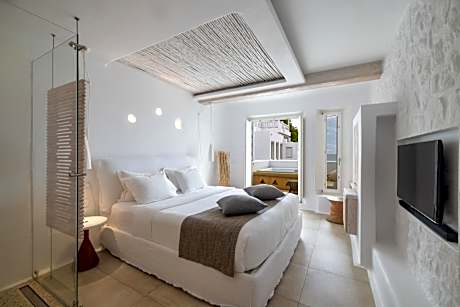 Deluxe Room with Outdoor Hot Tub and Partial Seaview