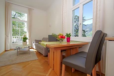 One-Bedroom Apartment with Balcony and Mountain View
