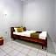 SPOT ON 91325 Pondok Hijau Guest House Syariah