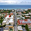 Tropical Beach Condo - Pool, Shops, 86" TV, WiFi