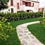 Casa Antia, nuovo bilocale con giardino in Residence con piscina