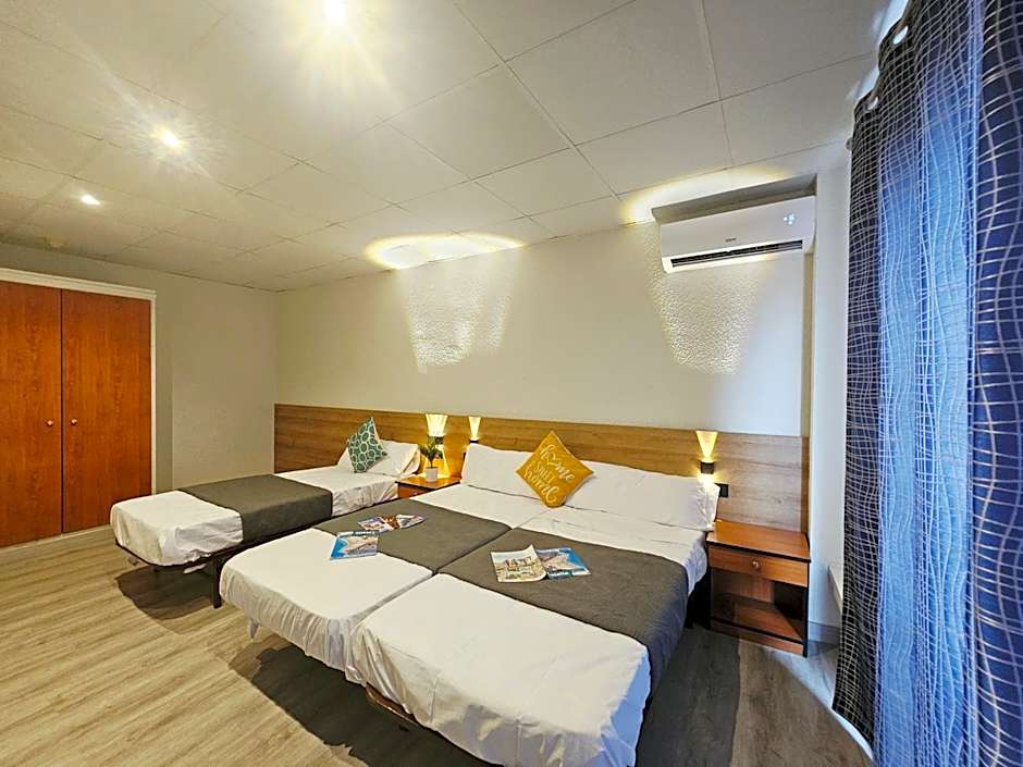 Photo 1 of 4 of Triple Room with Private Bathroom